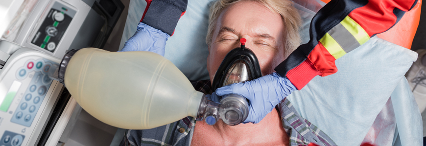Man in ambulance receiving oxygen