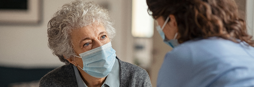 Physician talking with patient 
