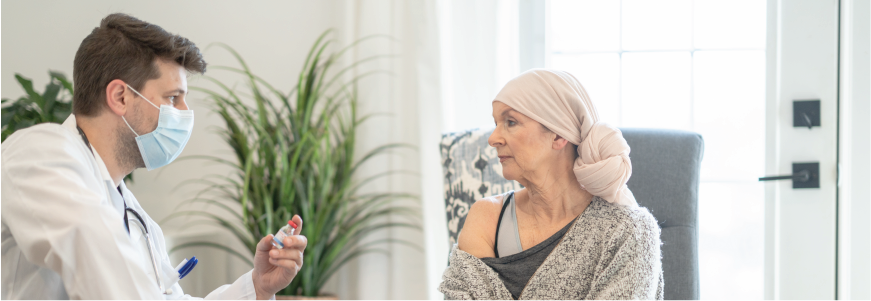 Woman with cancer at primary care visit