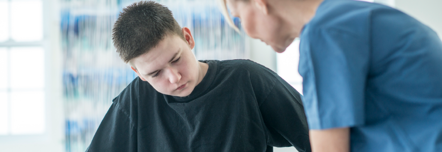Provider examining peds patient