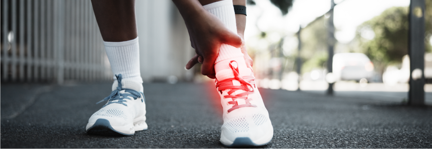 Shoes, ankle pain or exercise overlay in city, cramps or tension with fitness mistake on sidewalk.