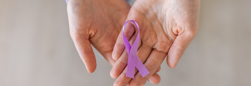 Unrecognizable woman holding in her hands purple ribbon