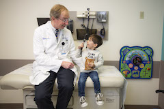 Duke pediatric neurologist with patient