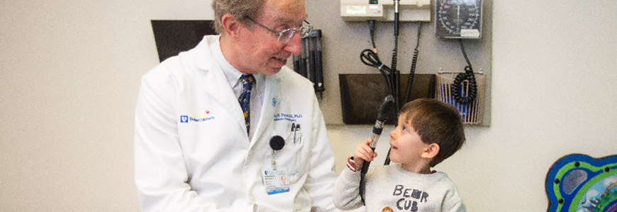 Duke pediatric specialist with a young male patient