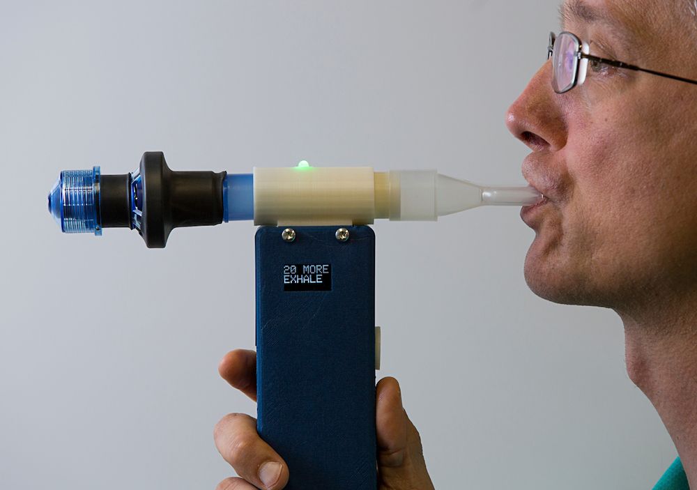 FIGURE 2: Senior lab administrator Matthew Brown demonstrating the RMT monitor. Courtesy of Duke Health Photography.