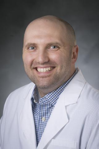 James E. Knutson, MD