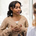 Black adolescent patient talking to physician