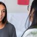 Teenage girl describes her symptoms to care provider