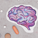 Collage of pills and illustration of brain