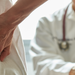 A doctor explaining lumbar anatomy to back pain patient