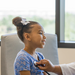 Doctor examines young patient