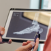 Physician helps to review and explain the findings of the x-ray to his patient.