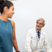 Patient walking on treadmill with physician supervision