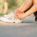 Young adult male with his muscle pain during running.