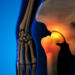 Skeleton with osteoarthritis hip joint pain